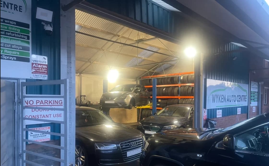 Mechanic working on a car